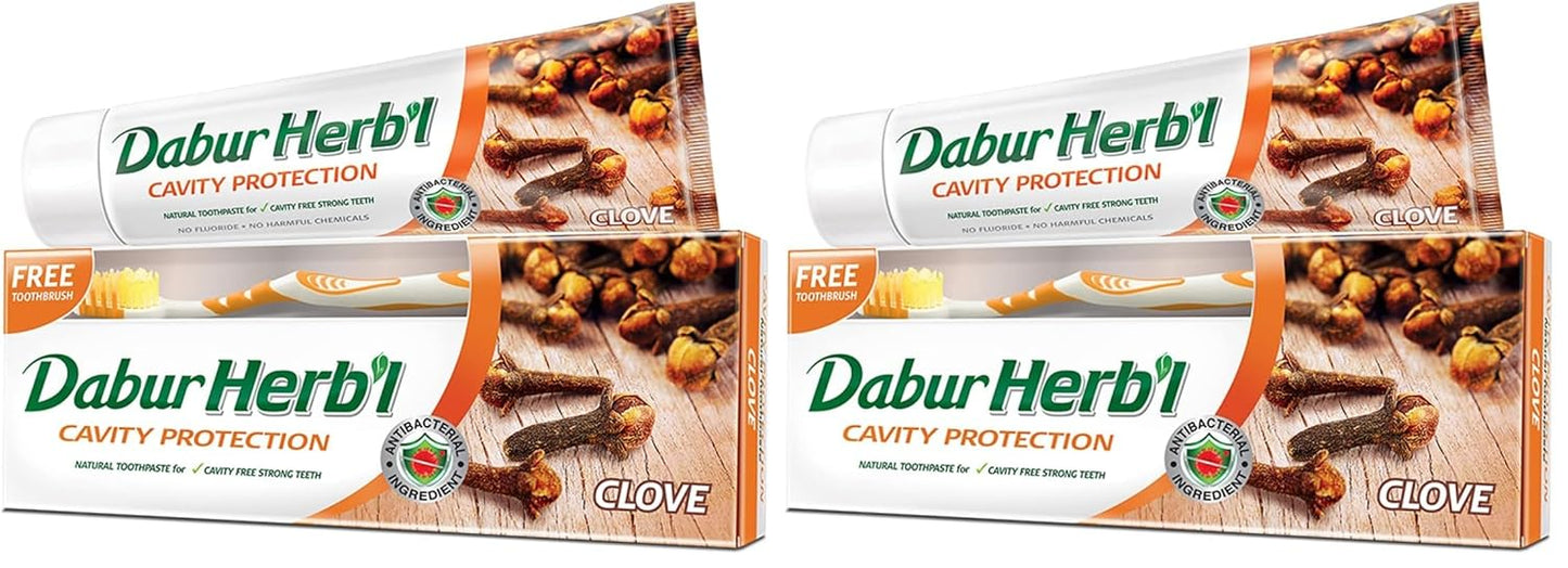 Dabur Herbal Cavity Protection Clove Toothpaste (140g) with Toothbrush | Enriched with Clove | Natural Toothpaste For Cavity Free Strong Teeth (Pack of 2)