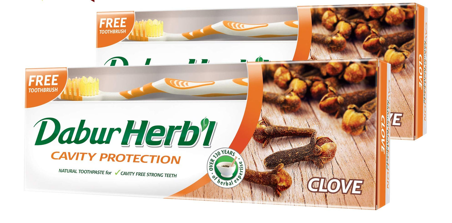 Dabur Herbal Cavity Protect Clove Toothpaste, 140 gm + Toothbrush (Pack Of 2)