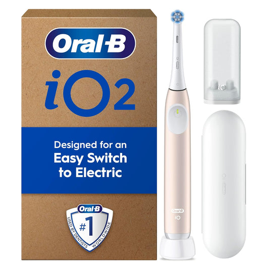 Oral-B iO2 Calm Pink Electric Toothbrush, 1 Toothbrush Head, 1 Travel Case, 1 Travel Refill Holder, Designed by Braun