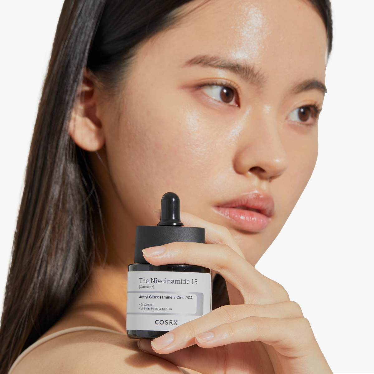 COSRX Niacinamide 15 Serum 20ml model holding product